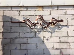 匠心雕琢 售樓部戶(hù)外不銹鋼藝術(shù)背景墻，激光圍邊與手工鍛造的藝術(shù)對(duì)話